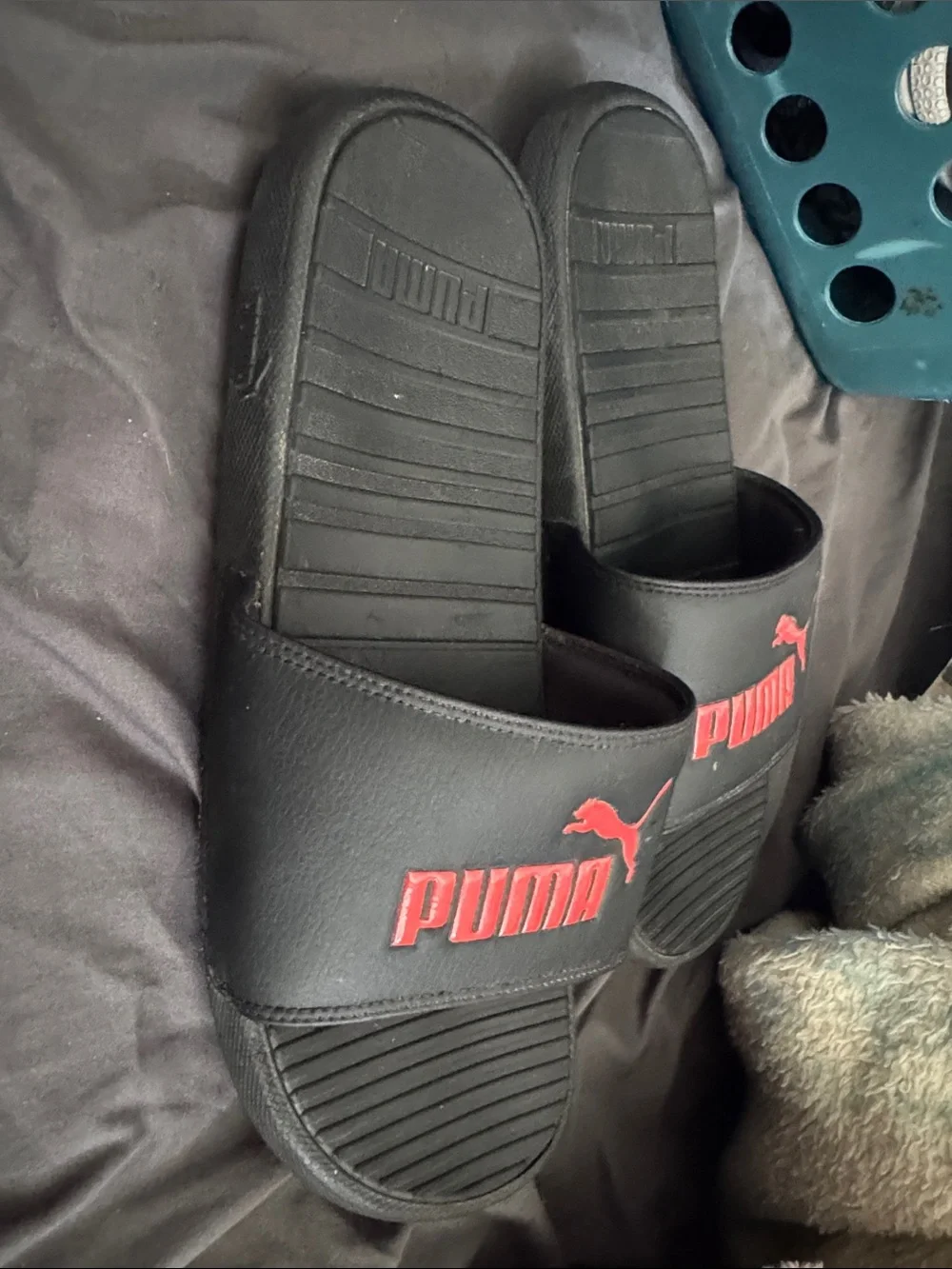 Puma Black Slides with Red Logo Accent